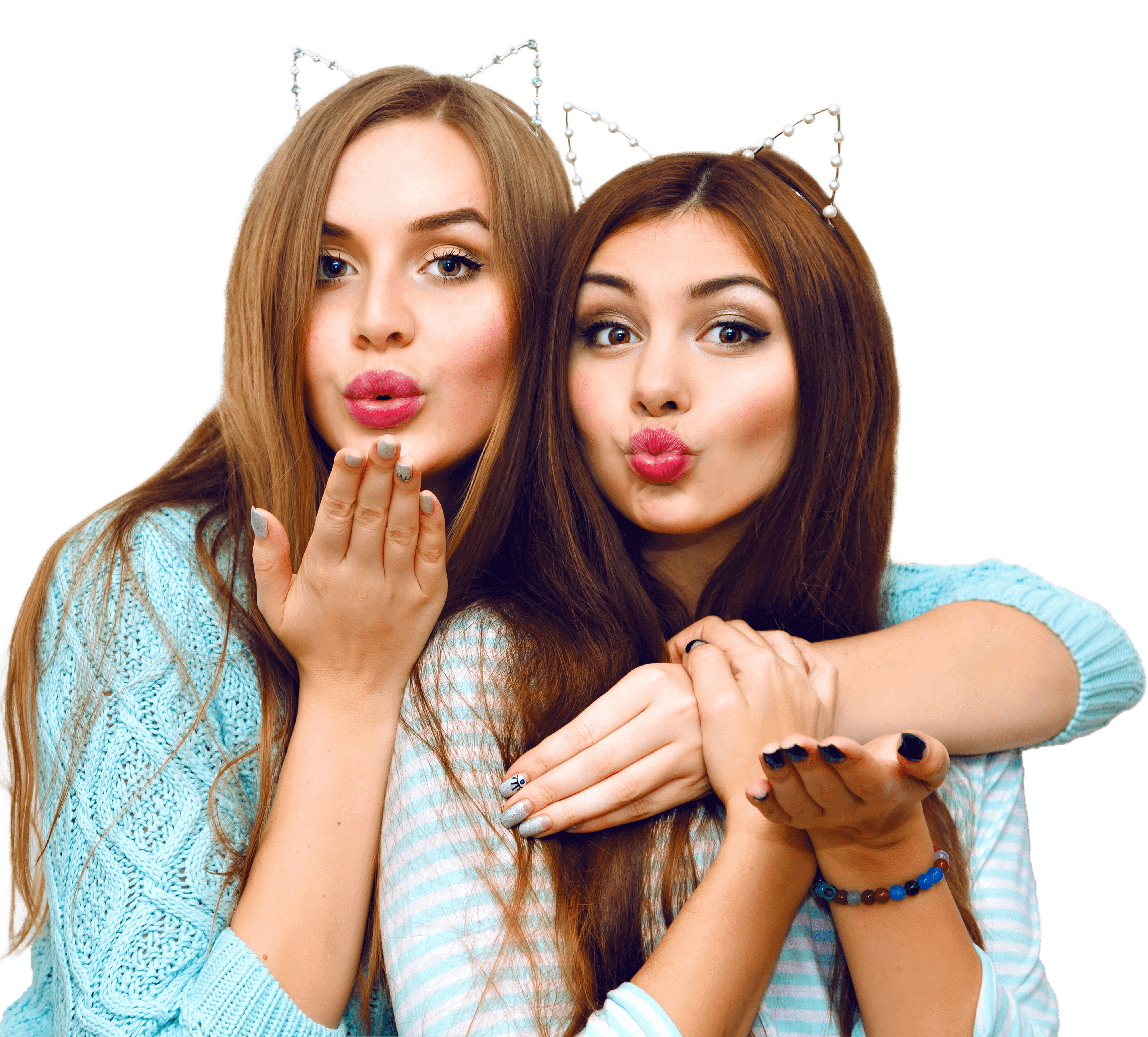 two girls wearing ears bands and blowing kisse